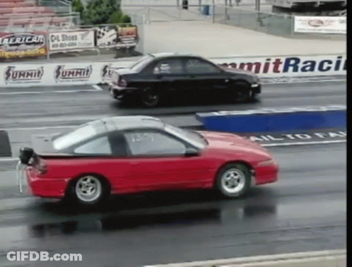 Red Car Passing Black Car On Summit Race Track GIF