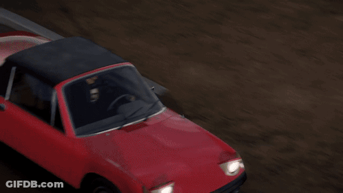 Red Car With Black Roof Driving GIF