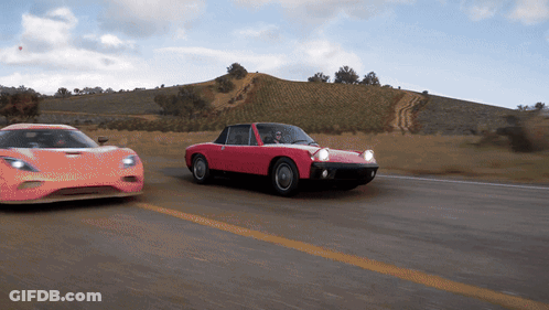 Red Car With Black Roof Driving GIF