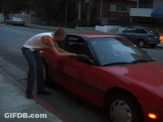 Red Car With License Plate Saying A GIF