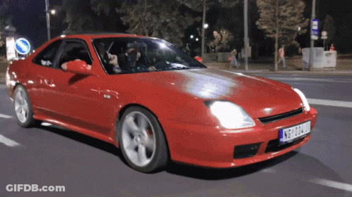 Red Car With Plate Nbg324u Driving GIF