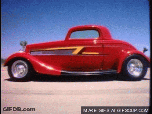 Red Car With Yellow Stripe Says Make GIFs At Gifsoup.com GIF