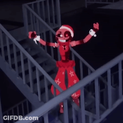 Red Cartoon Character With Santa Hat Standing On Railing GIF
