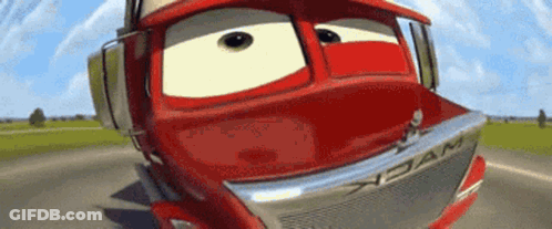 Red Cartoon Truck Driving Down Road GIF