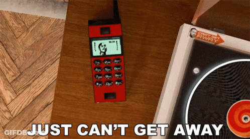 Red Cell Phone Next To Record Player Just Can't Get Away GIF