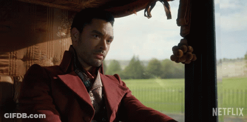 Red Coat Man In Car Netflix Logo GIF