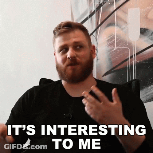 Red Collar Grey Tank Top Man In Player One Chair GIF
