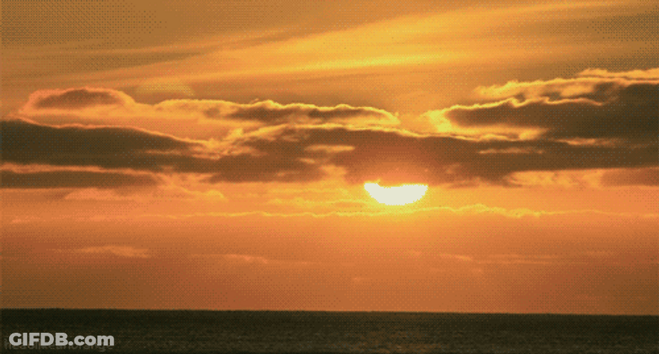 Red Dawn Passing Clouds GIF