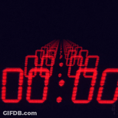 Red Digital Clock Displaying 7:07 GIF