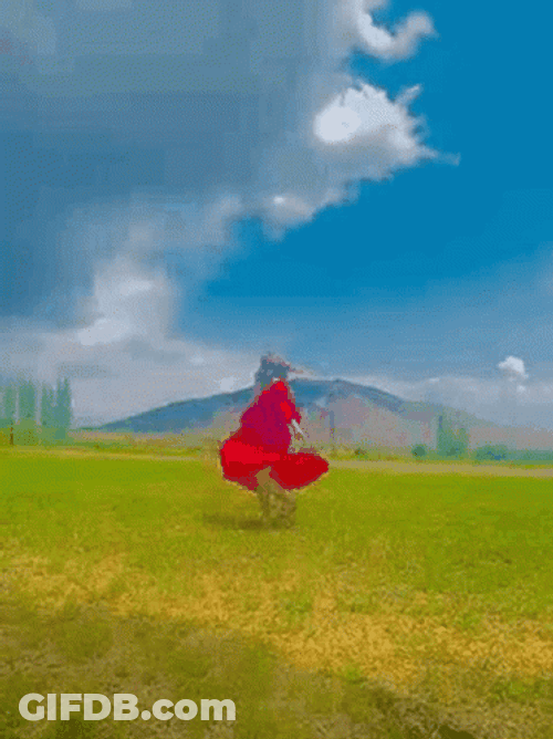 Red Dress In Mountain GIF