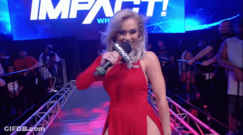 Red Dress Woman Holding Microphone Beside Impact Sign GIF