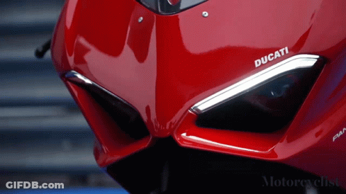Red Ducati Motorcycle With Sticker On Front GIF