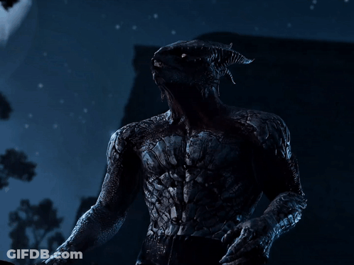 Red-Eyed Horned Demon In Dark GIF