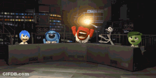 Red-Faced Cartoon At Table With Buttons GIF