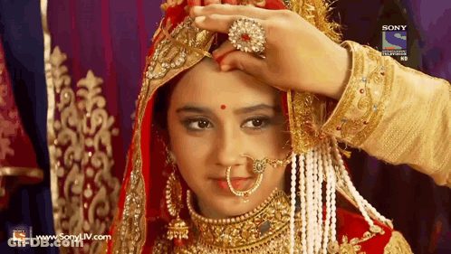 Red Gold Woman Touched By Man Sony Ad GIF