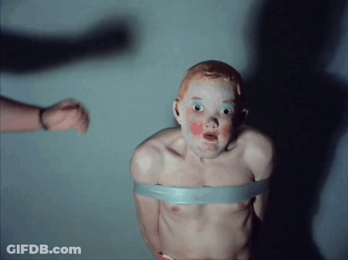 Red Hair Boy Tied Up With Tape GIF