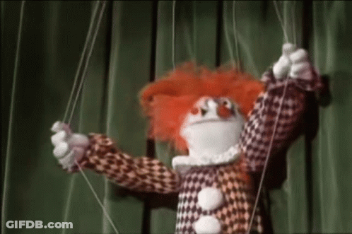 Red Hair Clown Puppet Pulled GIF