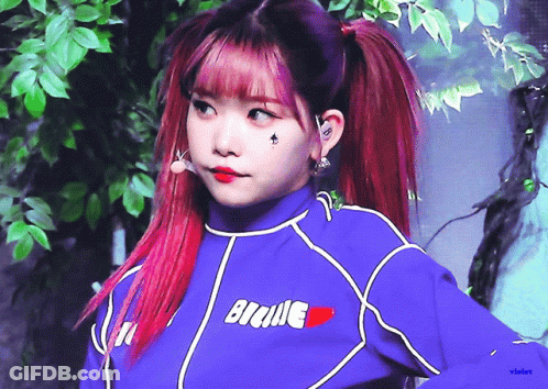 Red Hair Girl In Blue Shirt Saying Bickie GIF