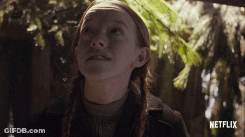 Red Hair Girl Looking Up At Sky With Netflix Logo GIF