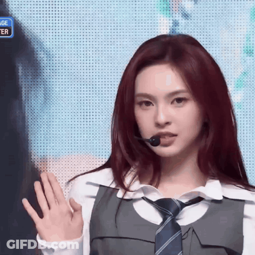 Red Hair Girl With Tie And Microphone GIF