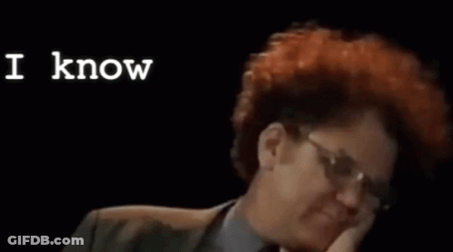 Red Hair Glasses Man In Suit Saying I Know GIF