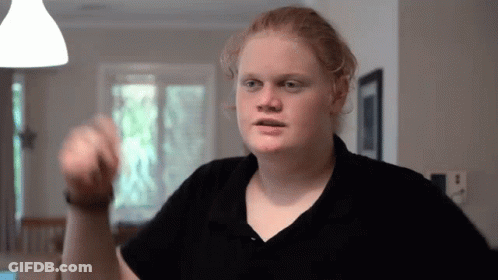 Red Hair Man In Black Shirt Making Funny Face GIF