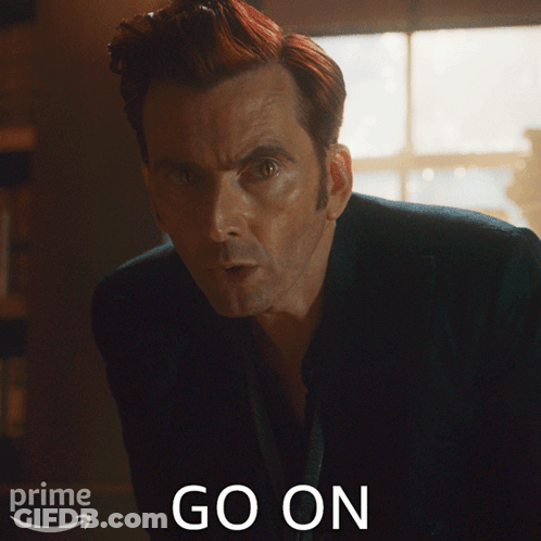 Red Hair Man In Front Of Prime Go On Sign GIF
