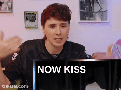 Red Hair Man Sitting At Computer Saying Now Kiss GIF