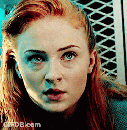 Red Hair Woman Looking At Camera GIF