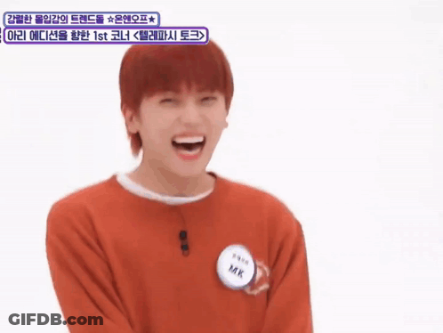 Red-Haired Boy Laughing With Mk Name Tag GIF