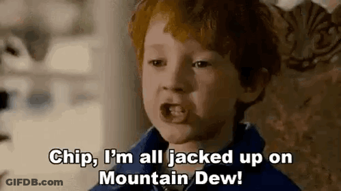 Red-Haired Boy Sitting In Chair Talking GIF