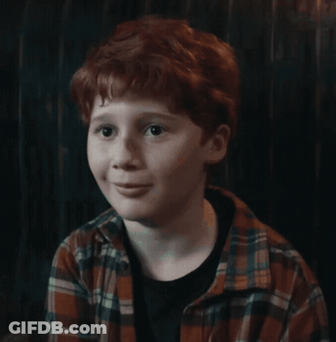 Red Haired Boy Smiling In Plaid Shirt GIF