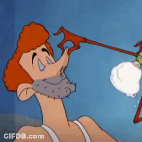 Red-Haired Cartoon Character Holding Red Object In Mouth GIF
