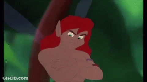 Red-Haired Cartoon Character With Wings Standing Next To Tree GIF