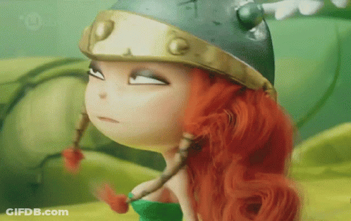 Red-Haired Doll In Helmet And Green Top GIF
