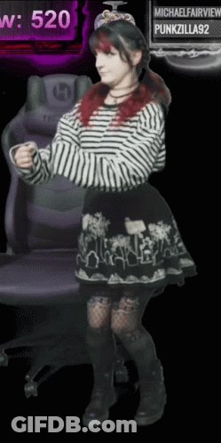 Red-Haired Girl Dancing By Purple Chair 520 GIF