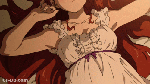Red-Haired Girl Lying On Bed In White Dress GIF