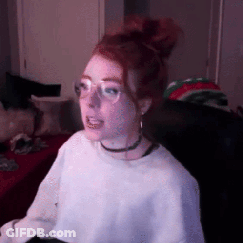 Red-Haired Girl With Glasses And Choker GIF