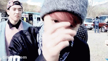 Red-Haired Man Covering Face With Beanie GIF