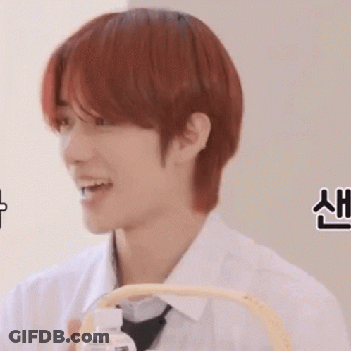 Red-Haired Man Holding Water Bottle In Basket GIF
