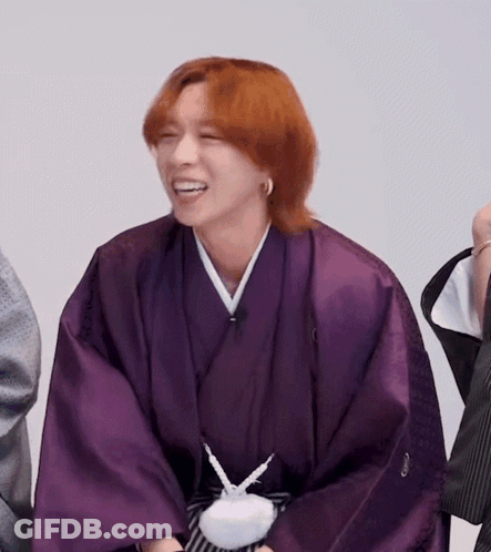 Red-Haired Man In Purple Kimono Smiling GIF