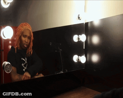 Red-Haired Man Looking In Mirror GIF