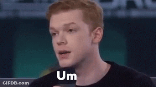 Red-Haired Man Making Funny Face At Microphone GIF