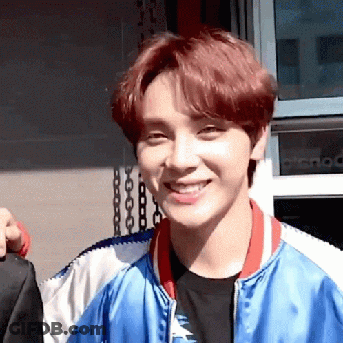 Red-Haired Man Smiling In Blue And White Jacket GIF