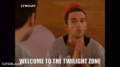 Red-Haired Man Talking To Another Man Welcome To The Twilight Zone GIF