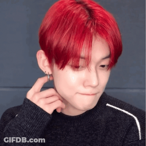 Red-Haired Man With Earrings And Black Sweater GIF