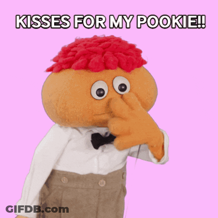 Red Haired Puppet Saying Kisses GIF