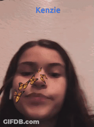 Red-Haired Stuffed Animal With Blue Eyes Fire GIF