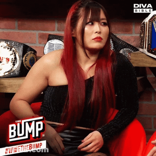 Red-Haired Woman At Diva Bible Sign GIF