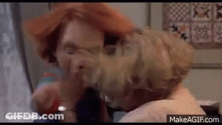 Red-Haired Woman Covers Face With Towel Another Woman Watches GIF